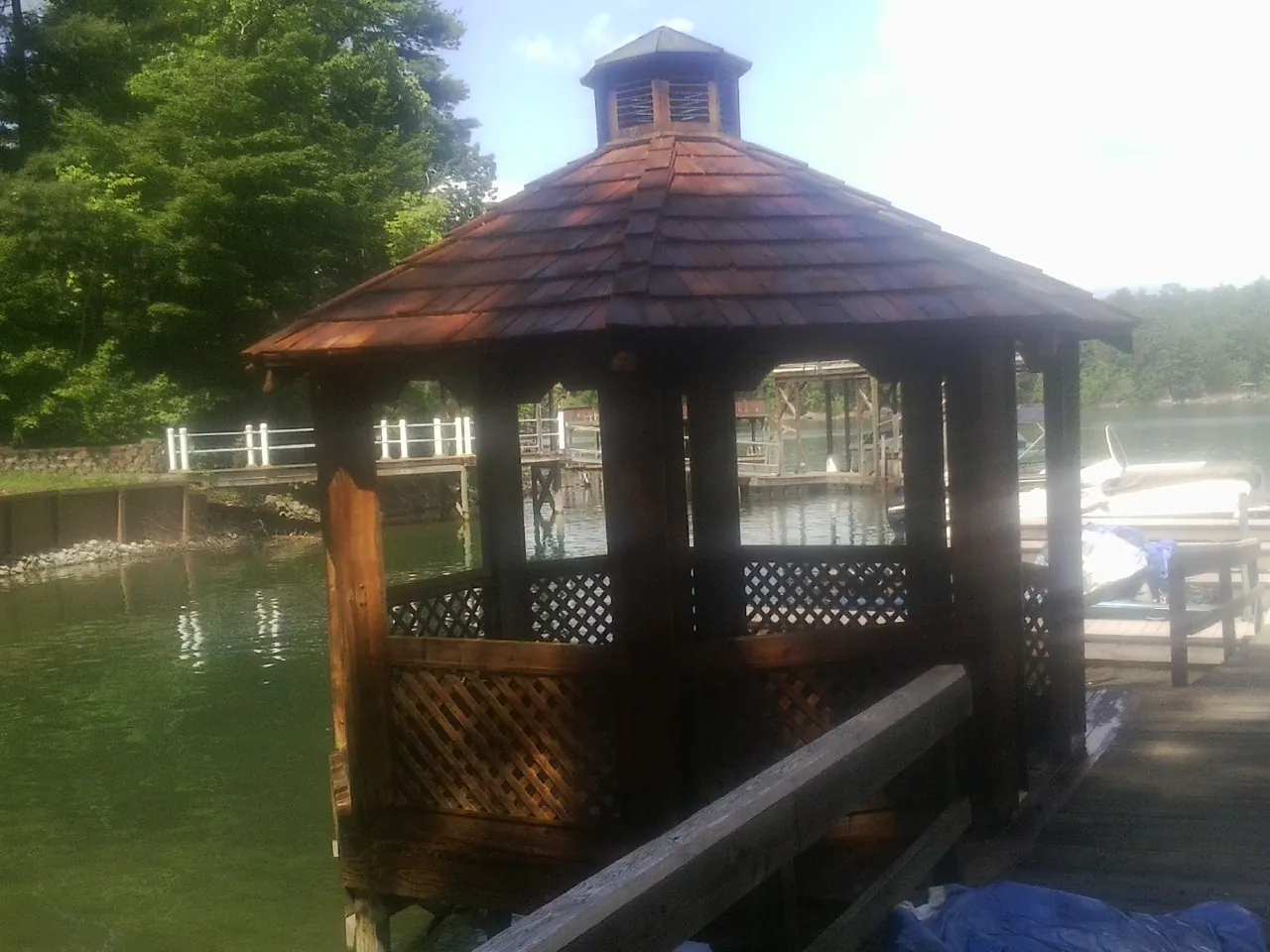 Cedar shake gazebo roof rebuilt on a lake dock in Waynesboro